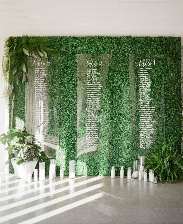51042740 352065338720925 5340873667887924213 n - Be inspired This green backdrop was used as a platform to display seating charts...