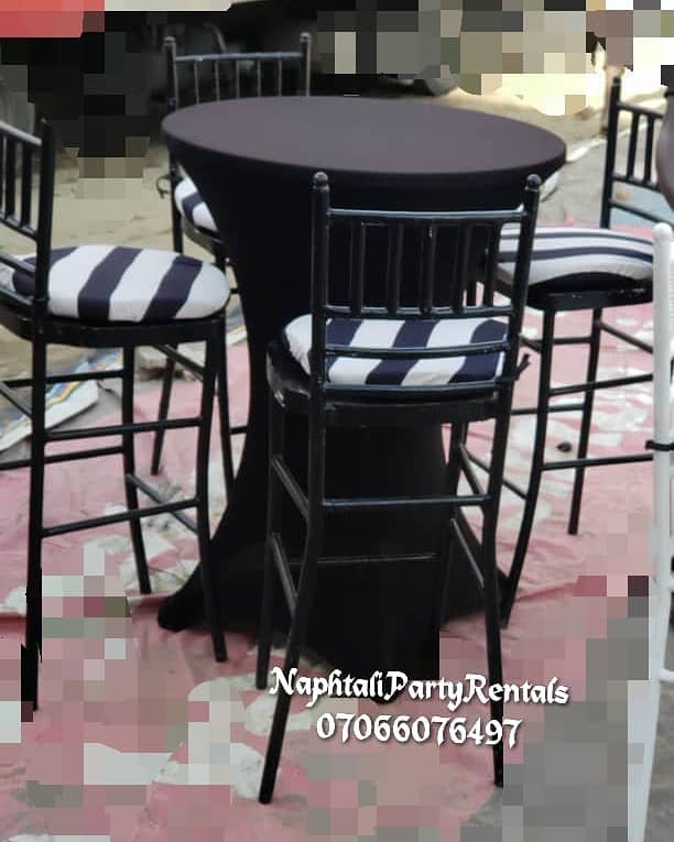 53661098 304360390233120 8550120789877135374 n - These elegant black cocktail tables and striped cocktail stools gives any settin...