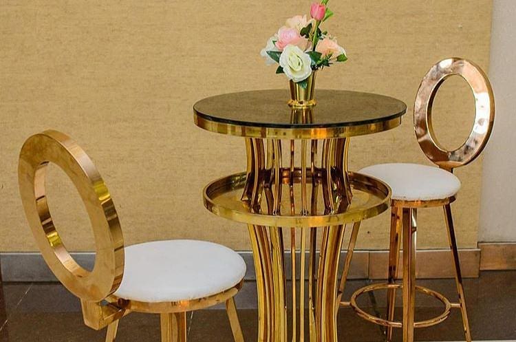 60426833 734419403626552 1997153623167611099 n - Create a magnificent party with our Gold OZ chairs and cocktail tables. They are...