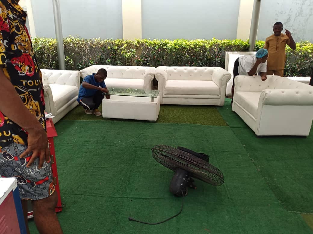 64868582 150799809391551 7401367322832287583 n - Lounge area setup in progress.
.
.
Items: White lounge chairs, green artificial ...