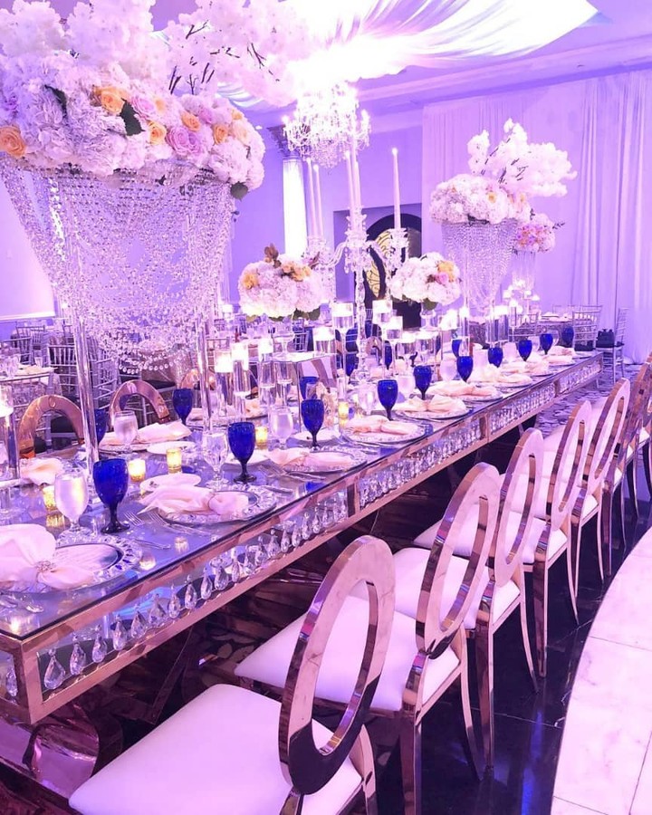 40979284 587934798287620 3001546176662844136 n - Breath taking space, with gold OZ chairs, high floral centerpieces and glass mir...