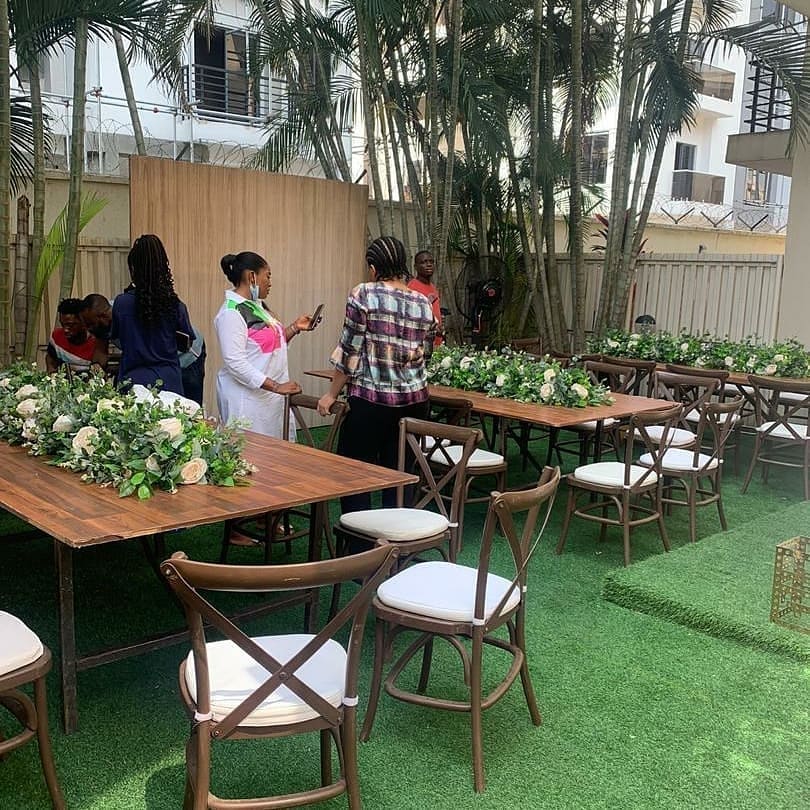 159992073 1275652192835769 5405442135861796682 n - Cross back chairs, floral centerpieces, tables and artificial grass supplied by @naphtalieventsandre...