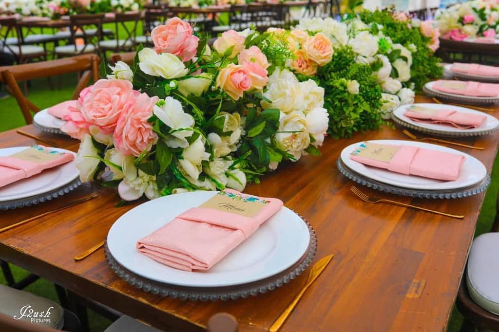 217629100 343596567236925 5090896742409500012 n - Radiant table settings like this one always make the difference!! 

With beautiful floral designs an...