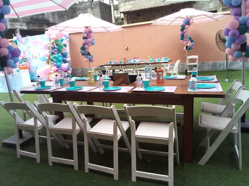 217693199 344486917273156 6328345314413415426 n - Table Settings with Wooden Beach chairs looking glamorous and exquisite for the lovely outdoor birth...