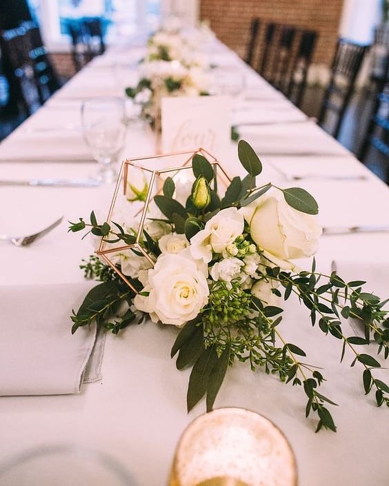 230432383 132396865731223 7277590042432642809 n - Gorgeous floral centerpieces sitting pretty on the table! 

Your wedding table settings are not comp...