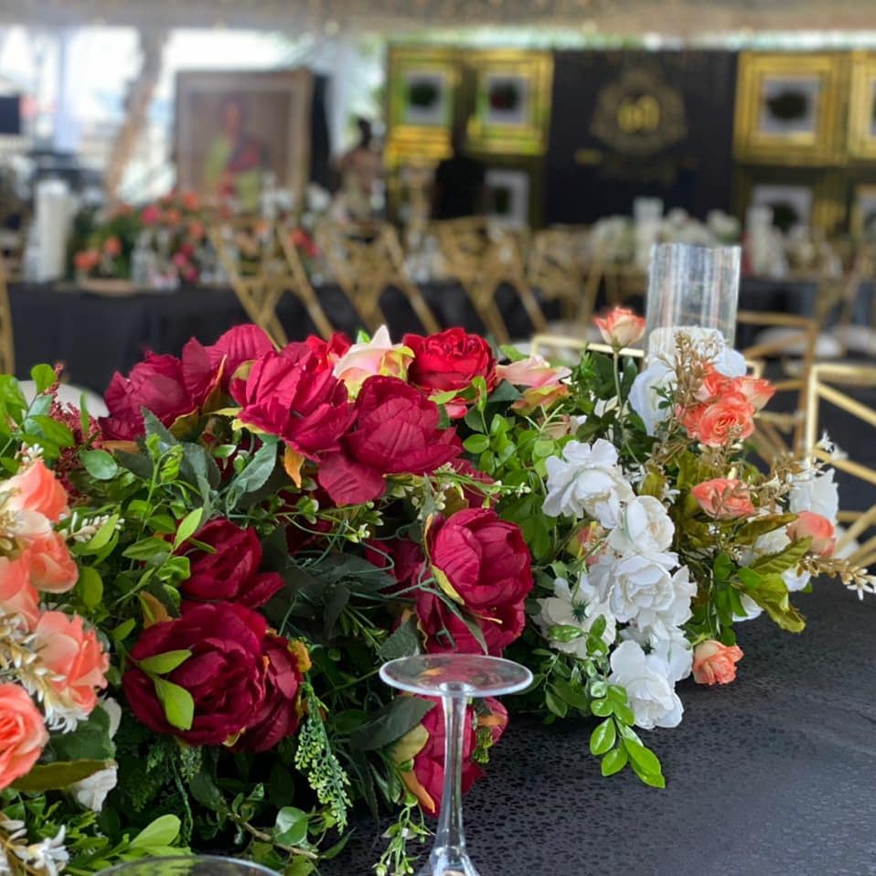 246159658 203499108530327 8458595938059944246 n - Table settings 
60th birthday party setup by 
@naphtalieventsandrentals 

Low floral arrangements  a...