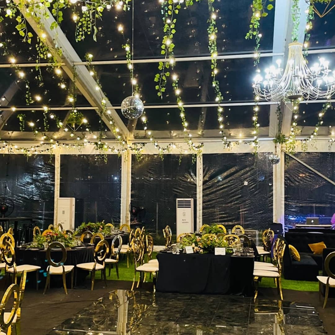 247515610 747440273323286 129244083669057498 n - All of the lights!!
Transparent tent decked with string lights. Love it
Event planning and decoratio...